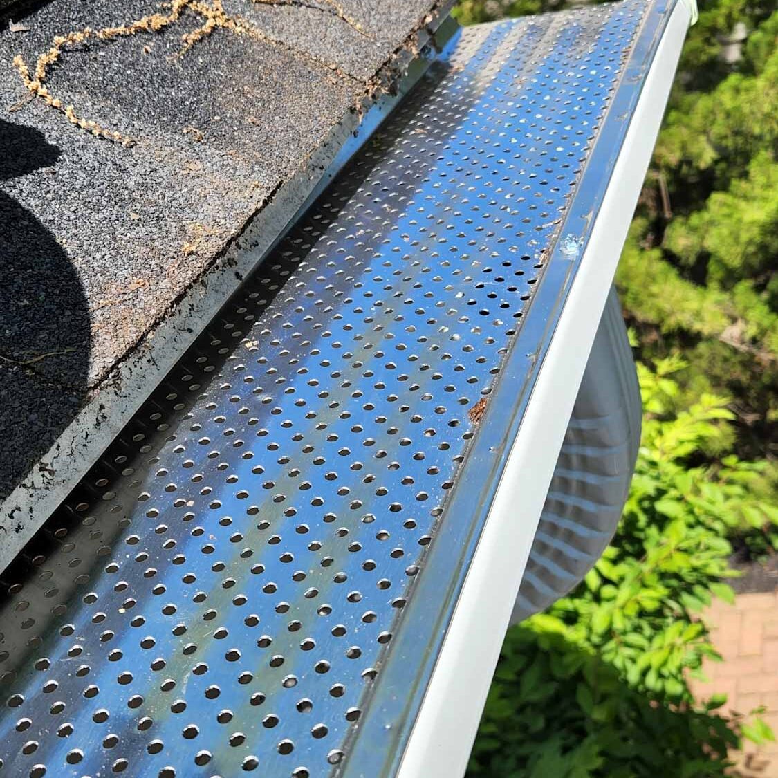 Perforated aluminum gutter guard