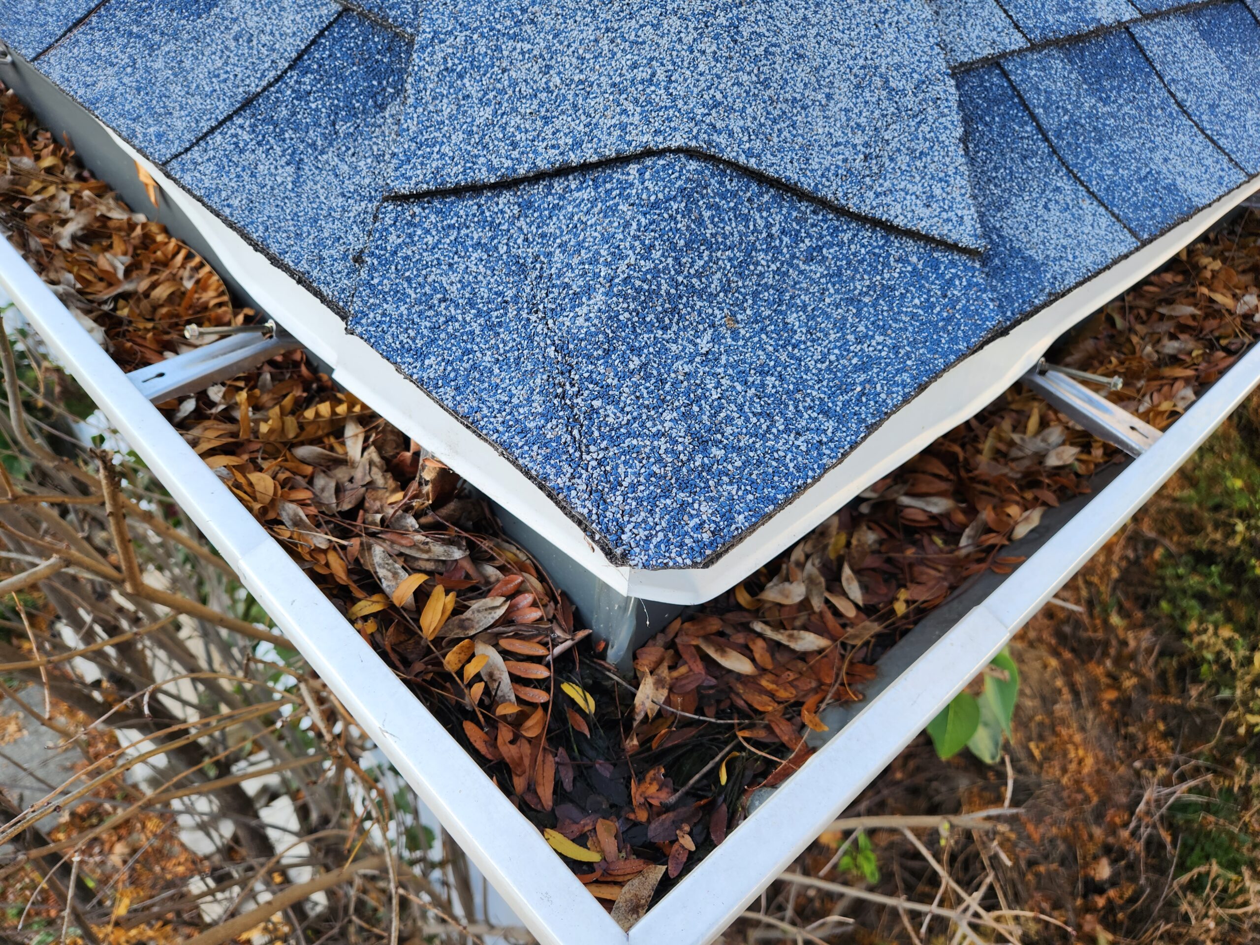 spring gutter cleaning gutter debris