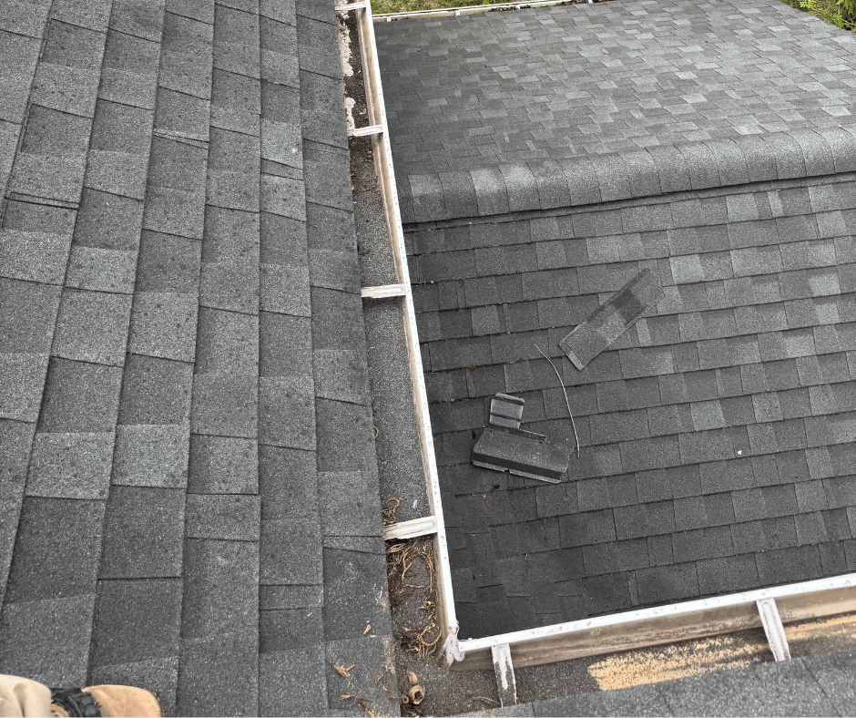 shingle grit accumulation in sagging gutter miter