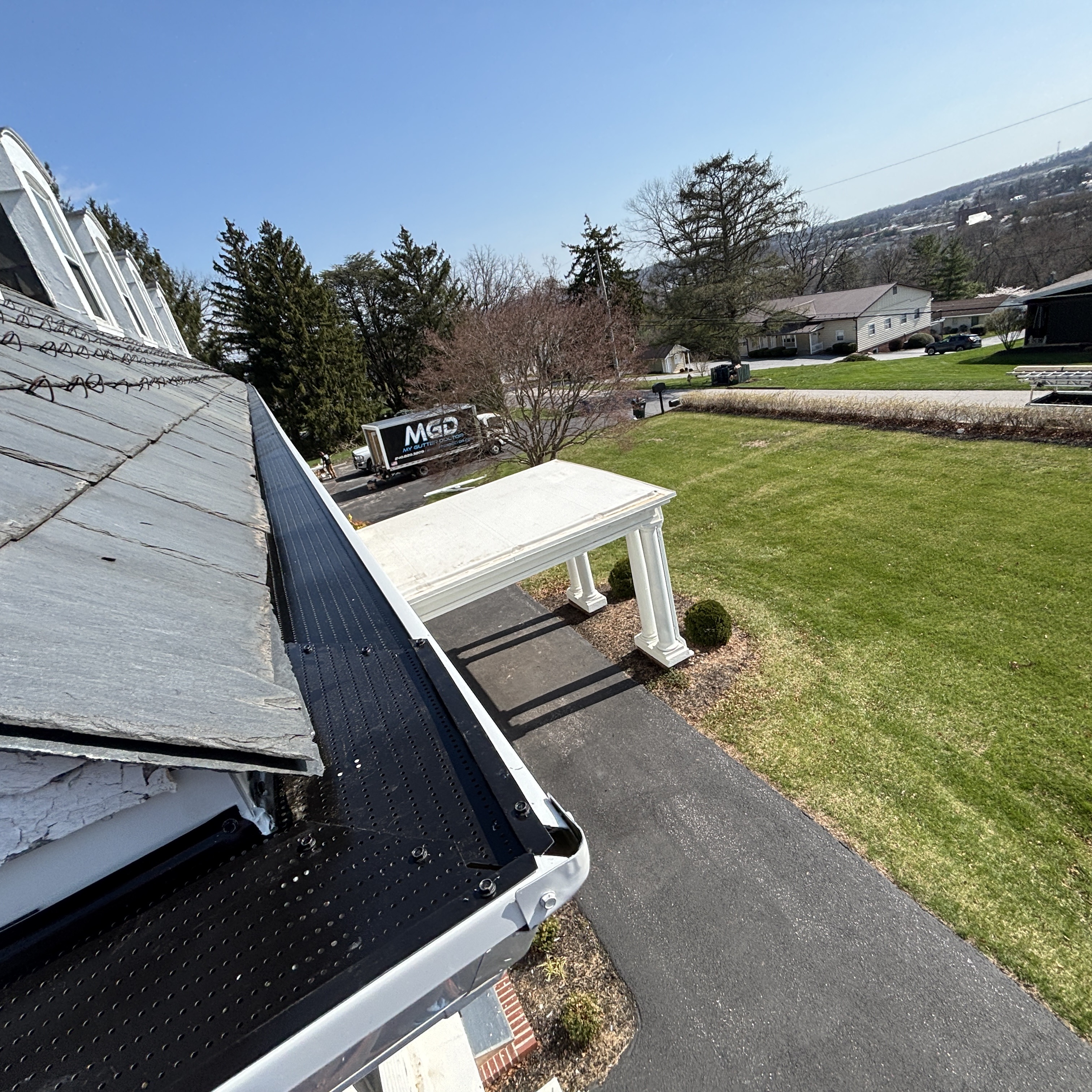 double pro gutter installed to slate roof