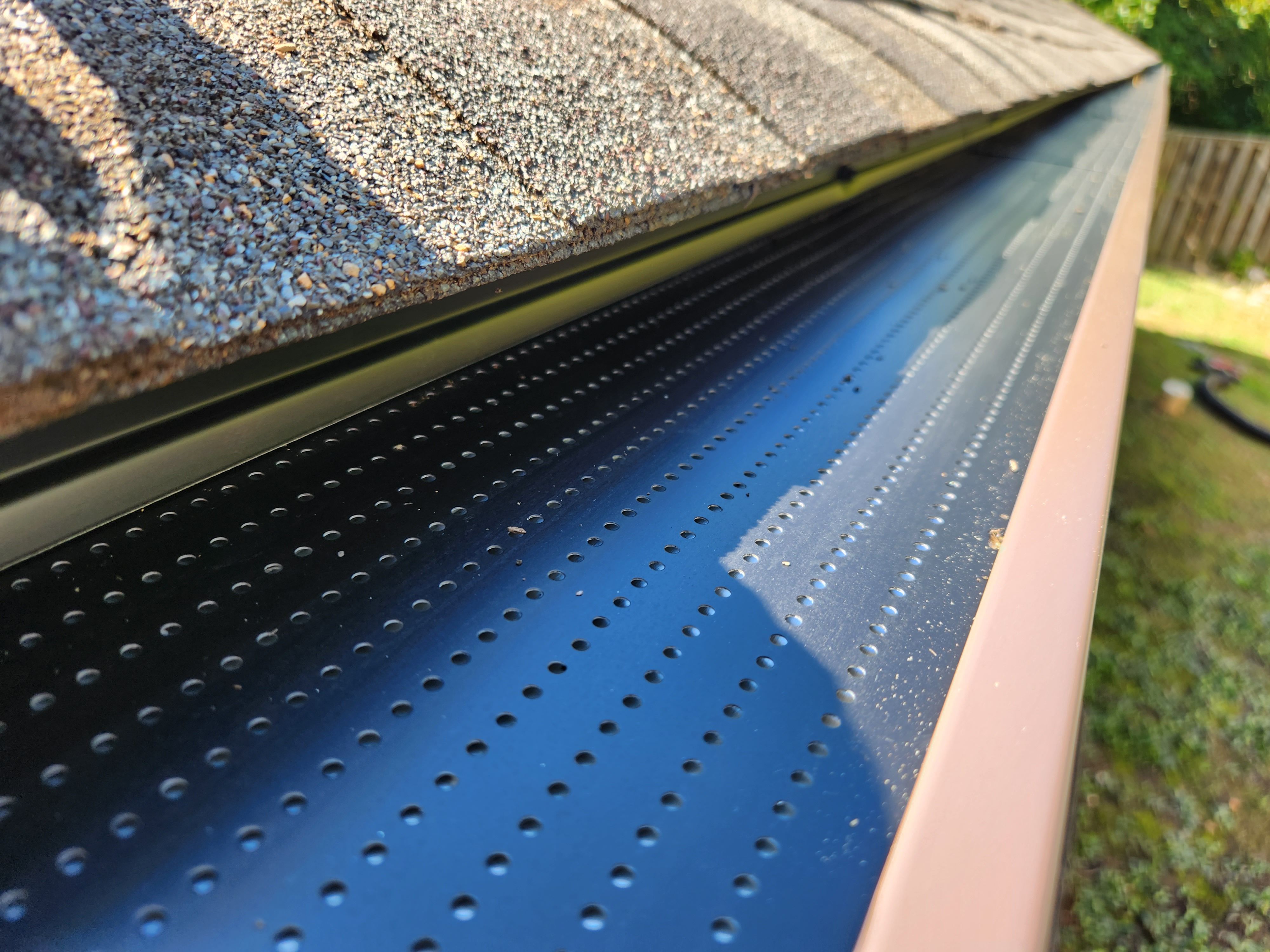 double-pro gutter guard installed to long roof line