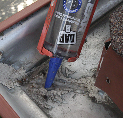 gutter corner sealant failure dry rot