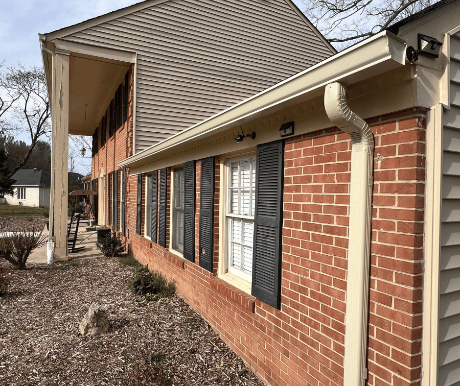 cream color seamless gutter installation potomac md