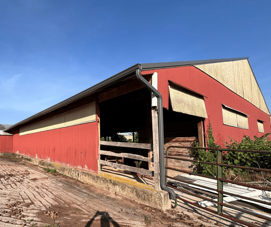 tuxedo gray gutter color installation horse barn